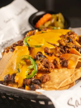 healthy nachos recipe with melted cheese and fresh toppings