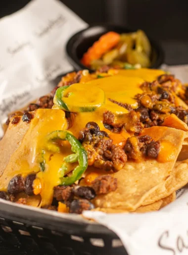 healthy nachos recipe with melted cheese and fresh toppings