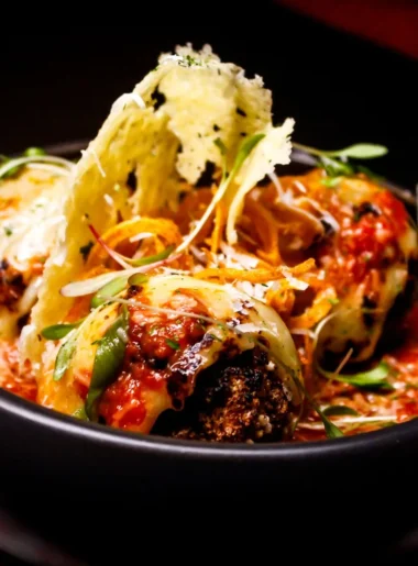 Meatball recipe without eggs, made with ground beef and pork, breadcrumbs, and cheese