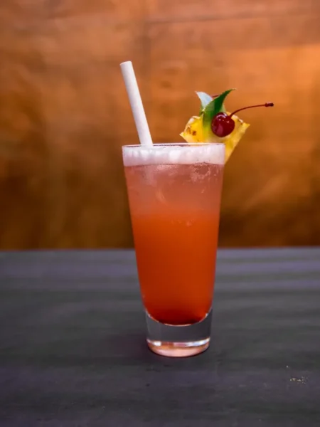 pineapple upside down cake drink recipe with cherry and pineapple slices
