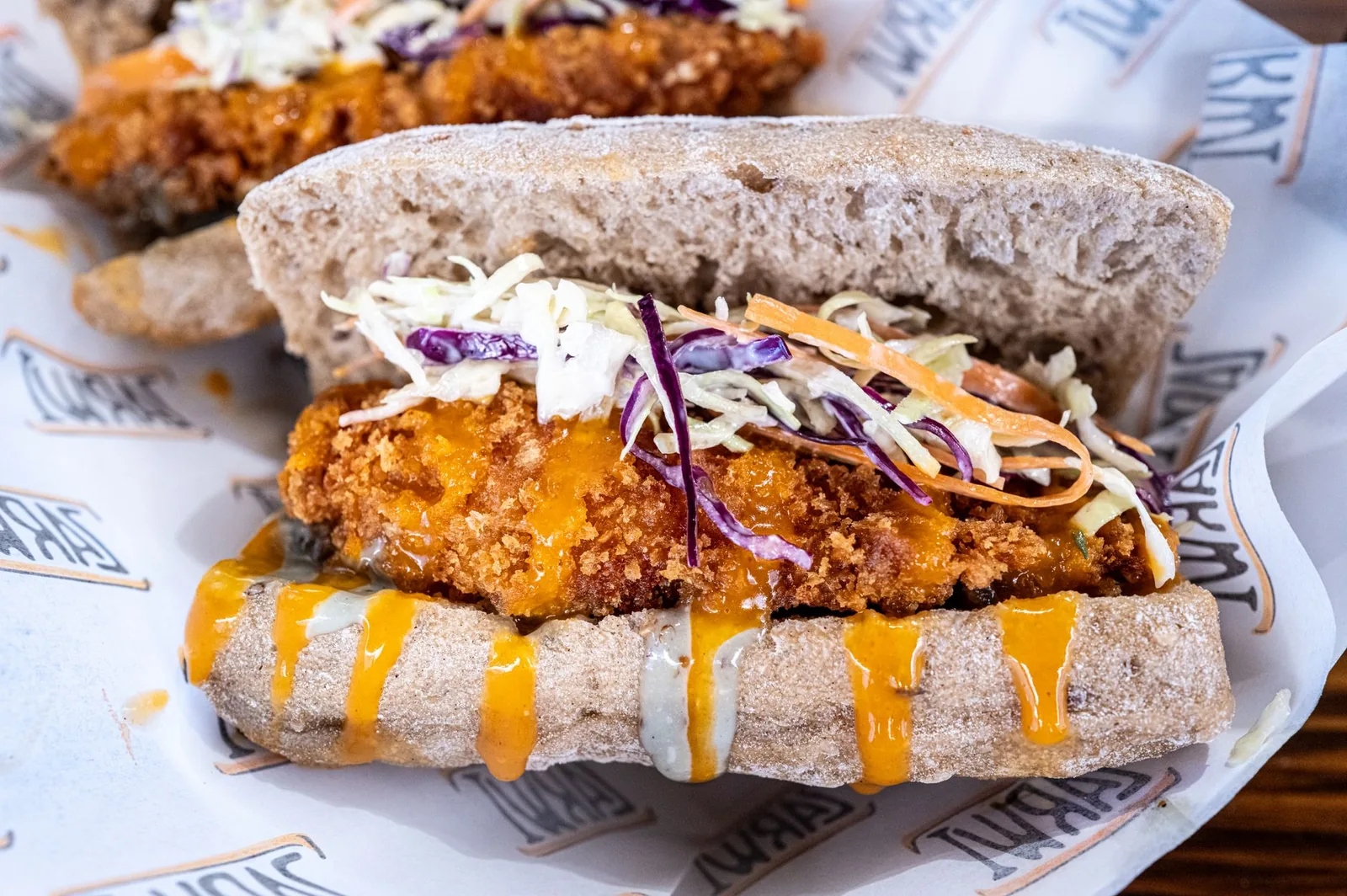 air fryer crispy buffalo chicken sandwiches on brioche with slaw