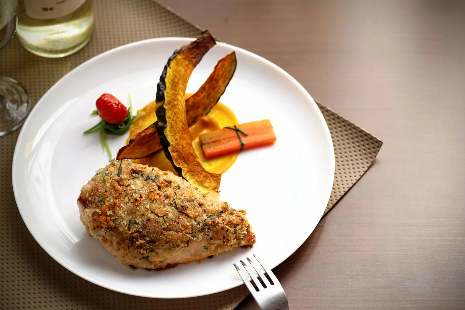 golden air fryer parmesan crusted chicken cutlets on slate board