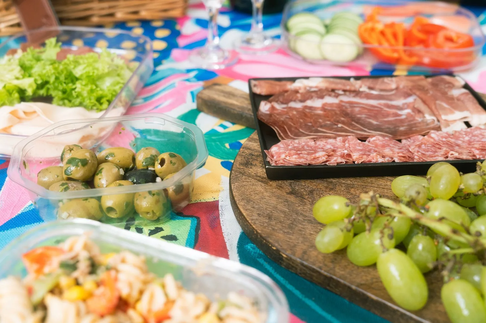 antipasto tortellini salad with salami, cheese, and vegetables in a bowl
