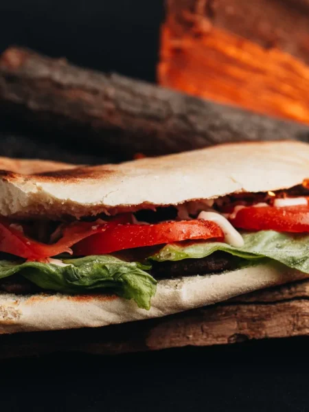 caprese sandwich recipe with fresh basil on ciabatta with tomato mozzarella and olive oil