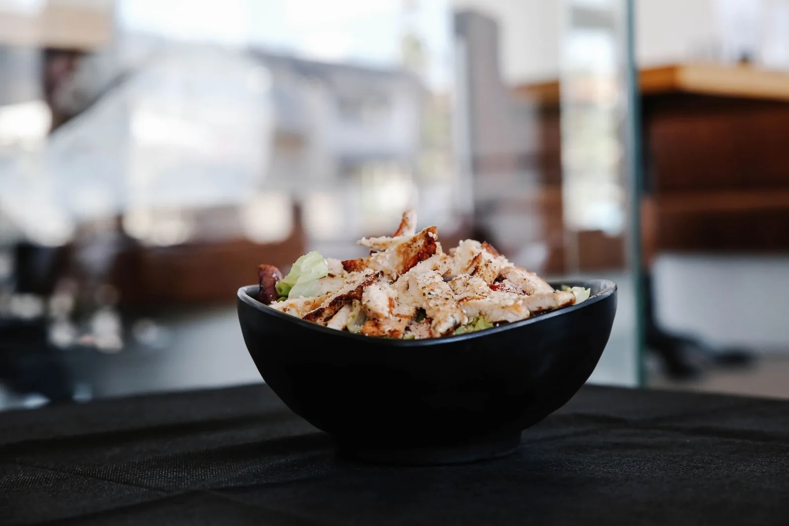 bowl of chicken salad with apples and walnuts