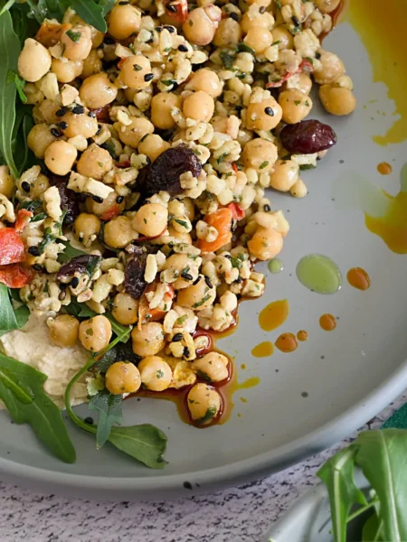 chickpea salad sandwich recipe vegetarian with mashed chickpeas, celery, dill, and romaine on toasted whole grain bread
