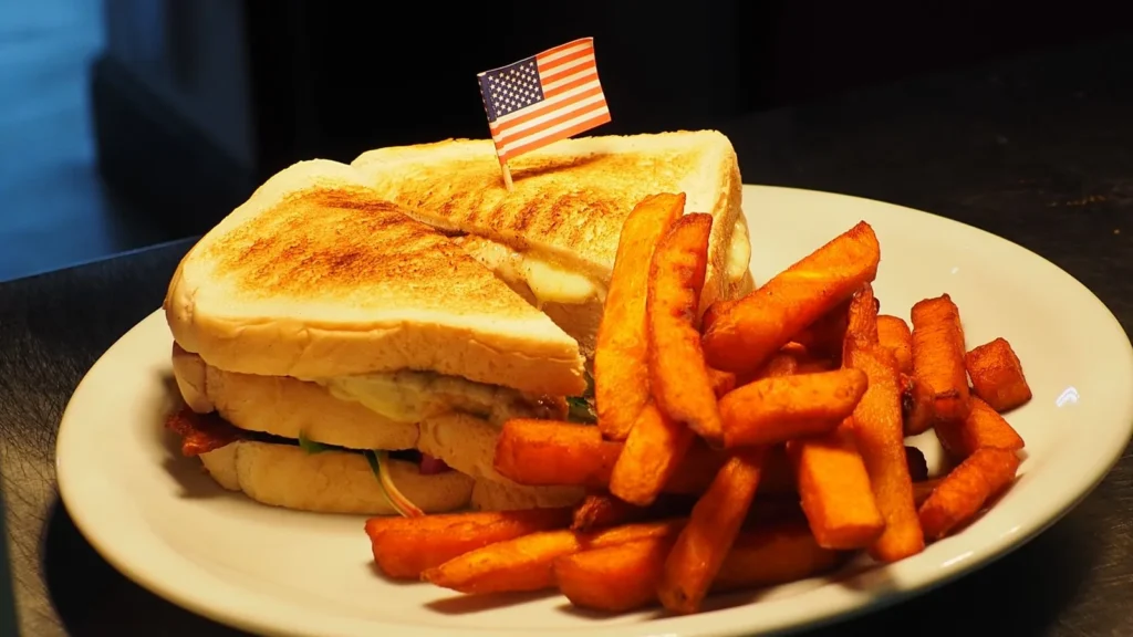 club sandwich recipe with turkey and bacon on toasted bread with lettuce tomato and crispy bacon quarters