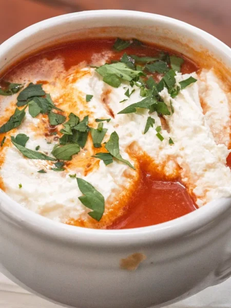 grilled cheese and tomato soup combo with golden crisp bread, melted cheddar, and red tomato bowl