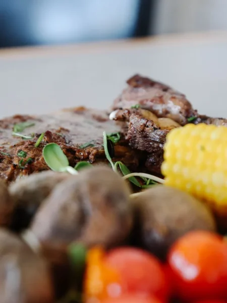 Grilled Steaks Corn On The Cob And Tomato Salad