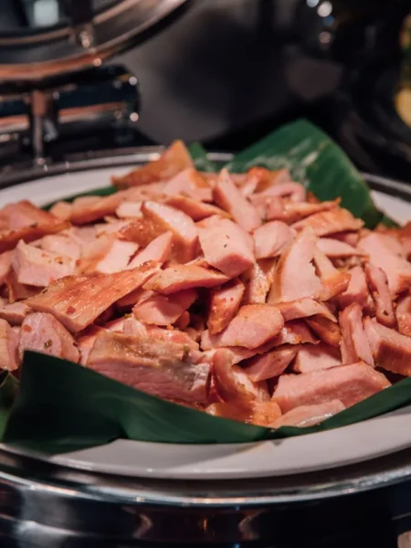 instant pot ham sliced and glazed with brown sugar mustard on a white platter