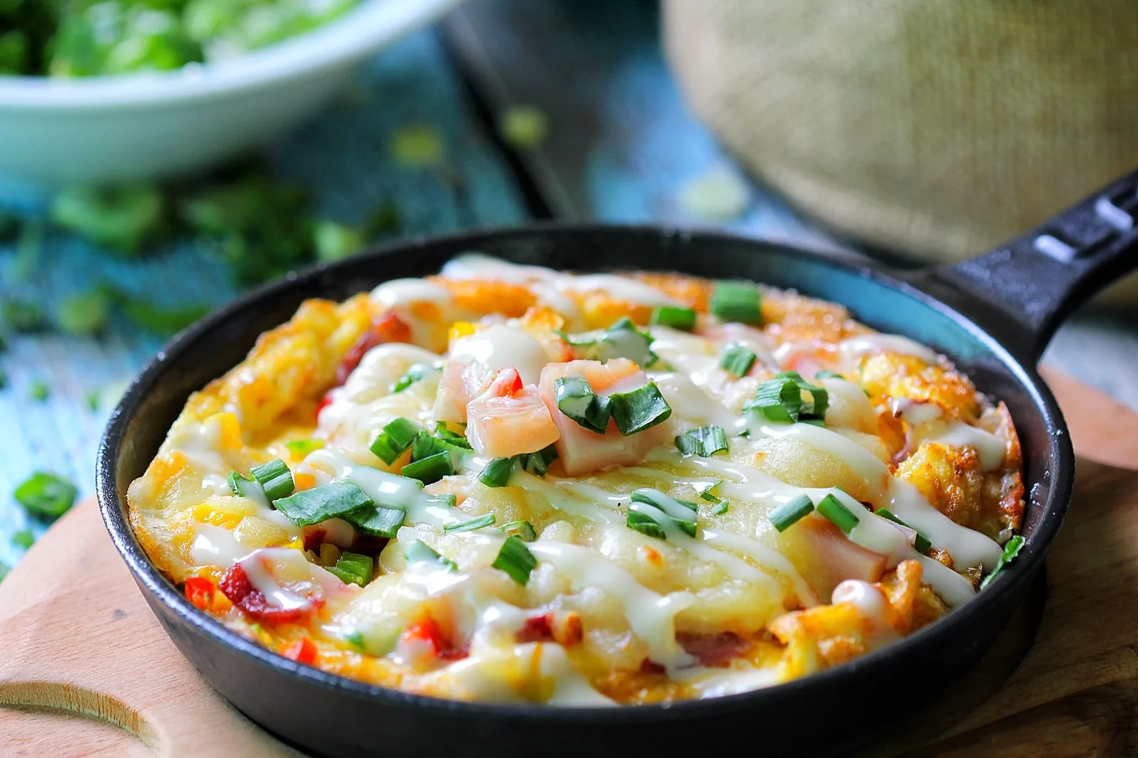 cheesy taco pasta with beef in a skillet