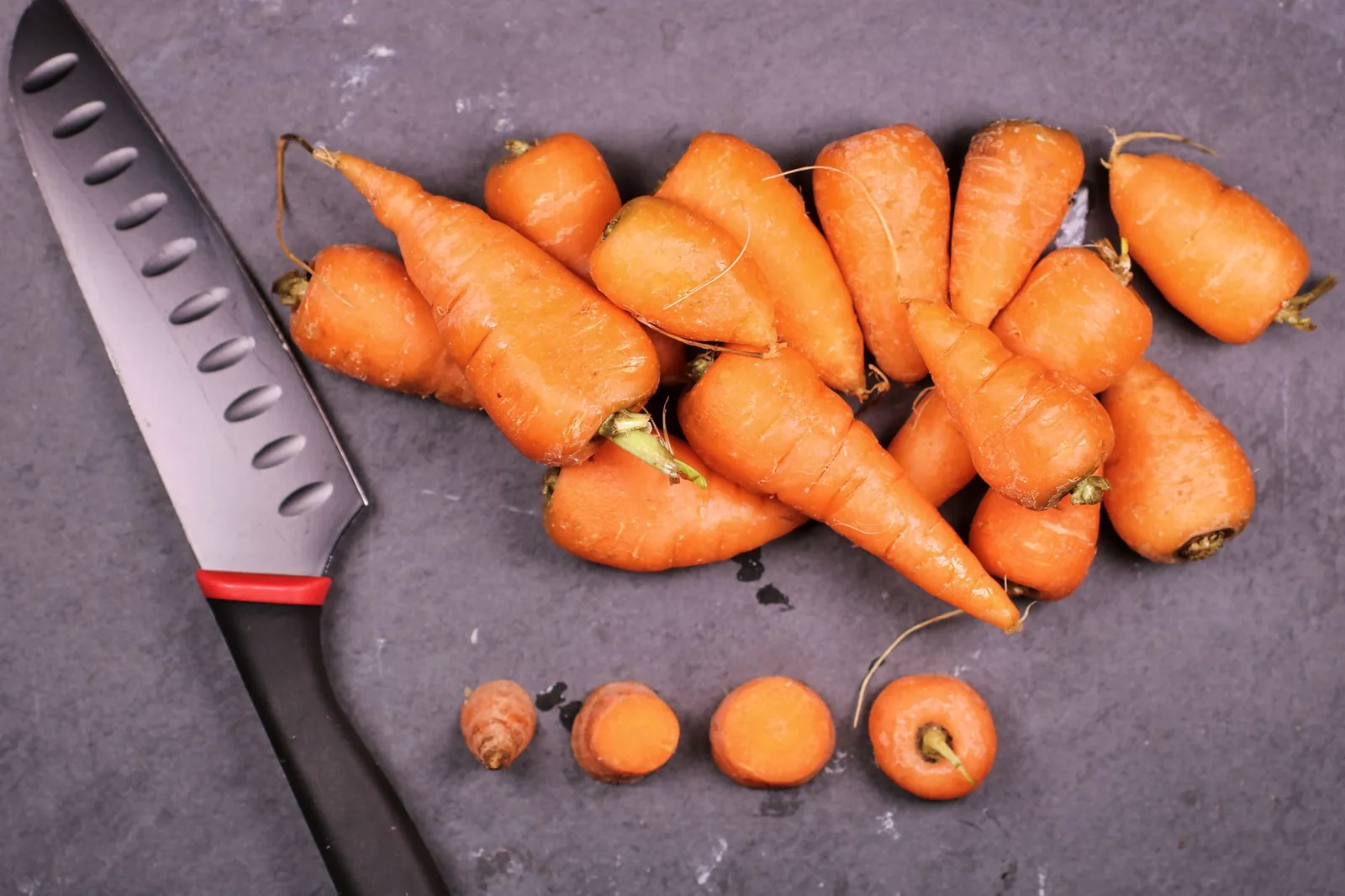 roasted garlic air fryer carrots in a basket with golden edges