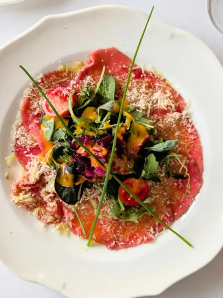 Sliced Beef With Tomatoes And Arugula