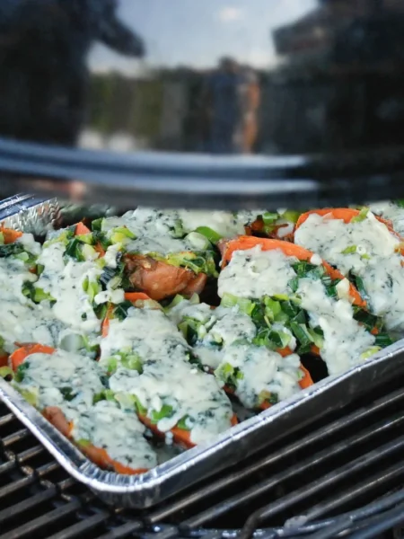 stuffed bell peppers recipe with ground turkey filled with rice, turkey, and melted mozzarella in a baking dish