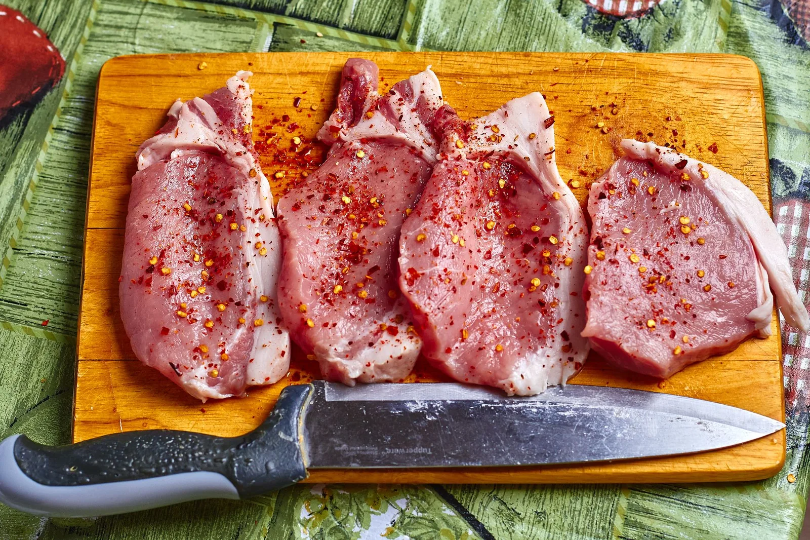 seared pork chops with cinnamon apples in a skillet